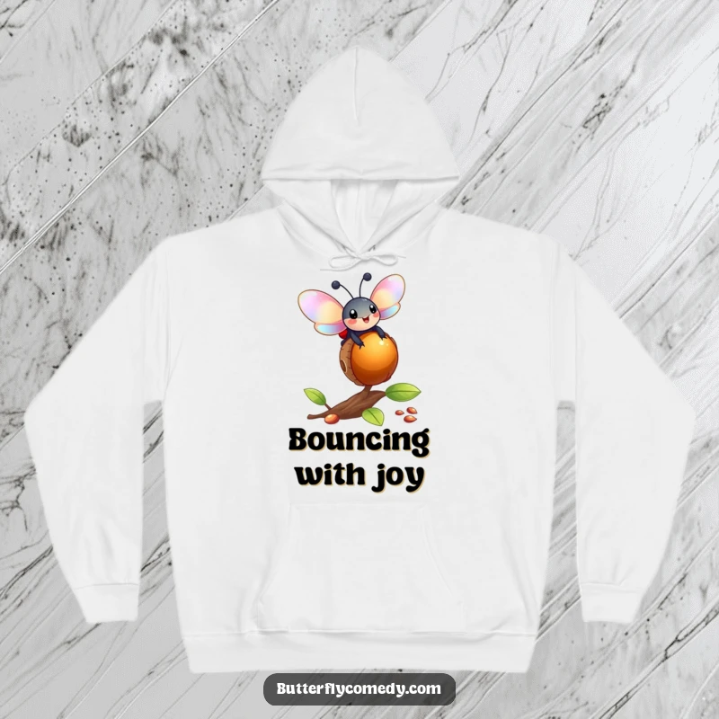 Funny ladybug with iridescent wings skillfully balancing on a bouncing acorn, designed for a warm and humorous hoodie.