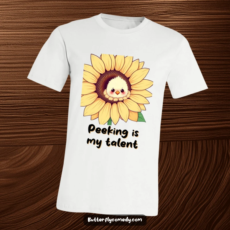 Funny fluffy chick emerging from a giant sunflower petal, radiating joy and innocence on a comfortable t-shirt.